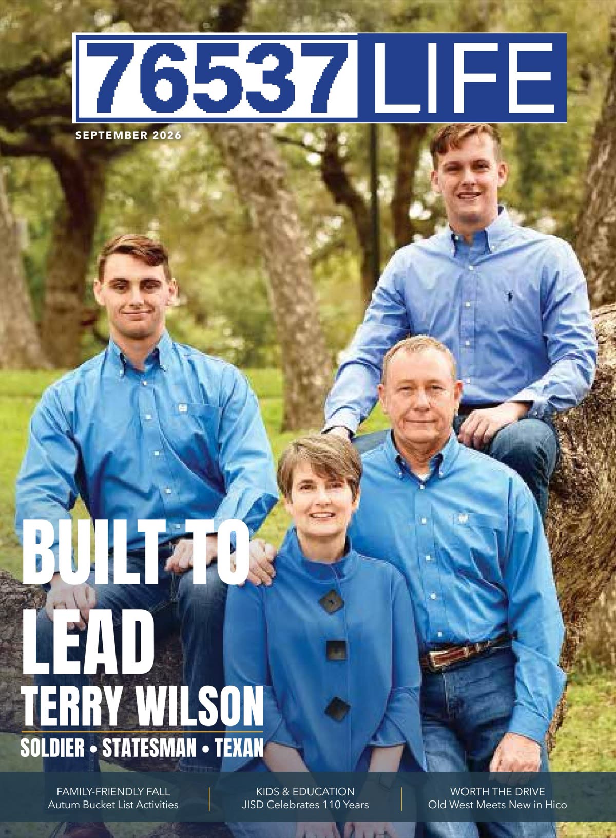 September 2026 cover of 76537 Life: Terry Wilson and his family in blue shirts, outdoors under the trees.